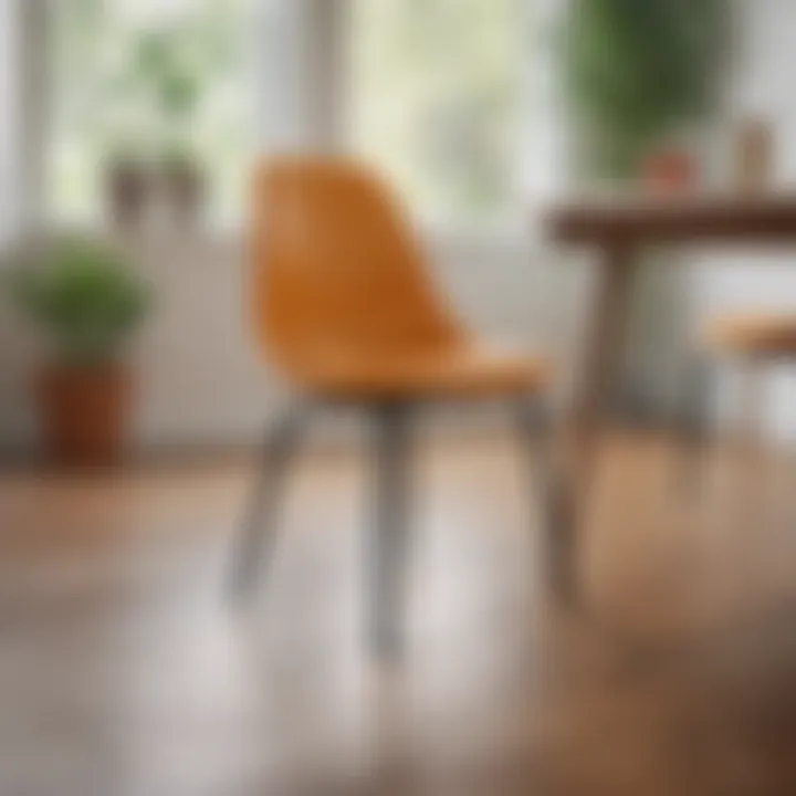 A classic mid-century modern plastic dining chair showcased in a minimalist dining room setting.