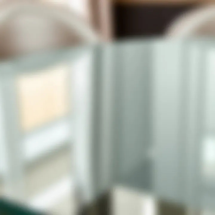 Close-up of the sleek glass surface of a round dining table showcasing its reflective quality