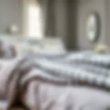 Elegant Draping of Gray Striped Bedspread Elegant gray striped bedspread draped elegantly over a plush bed