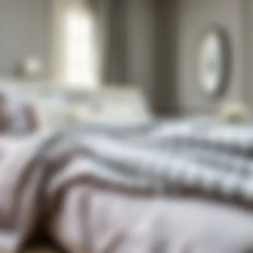 Elegant Draping of Gray Striped Bedspread Elegant gray striped bedspread draped elegantly over a plush bed